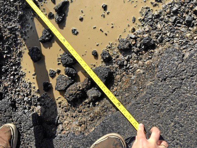 Geraldine Grimish, QLD was driving along Caniaba Road into Lismore on a wet night of July 5 when the pothole punctured the front left passenger side tyre and damaged both rims of her car, setting her back $750. Picture: Geraldine Grimish