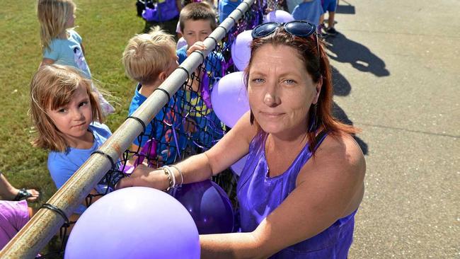 SUMMER'S DAY: Children dressed in purple to honour Summer Steer, who died in 2013 after she swallowed a button-sized battery. Summer's mum Andrea Shoesmith has been raising awareness on the risks of batteries ever since. Picture: Patrick Woods