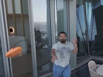 A publicity stunt by American Entertainer, Drake at the Crown Hotel in Sydney has been shared on social media. It shows a drone fly into his penthouse suite with a laptop showing a gambling website. These are screen grabs of the video Picture: X