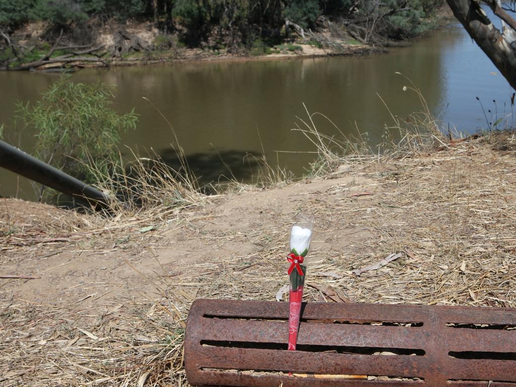 Flowers were placed on the banks of the Murray River in Moama after the boy’s body was found. Picture: David Crosling