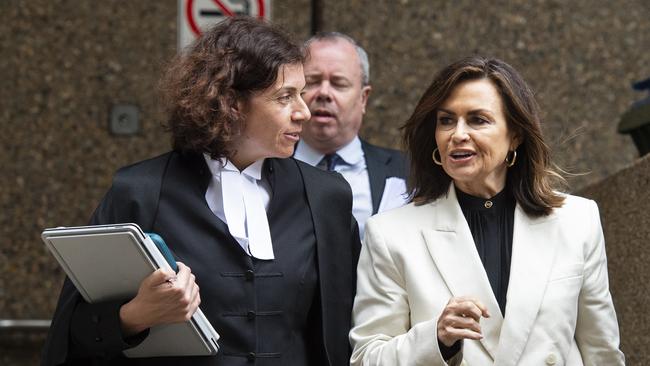 Lisa Wilkinson pictured exiting Federal Court Sydney with her lawyer on Thursday. Picture: NCA NewsWire / Monique Harmer