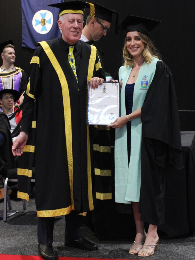 Caitlyn Bowell graduated with a Bachelor of Nursing at the CQUniversity graduation ceremony in Bundaberg on December 14, 2023.