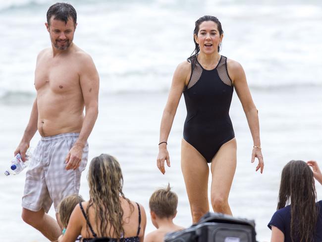 Mary wore a sleek navy one piece swimsuit. Princess Mary and her royal family hit Sydney’s Palm Beach for a dip before they head to Tasmania for an Aussie Christmas. Picture: Media Mode