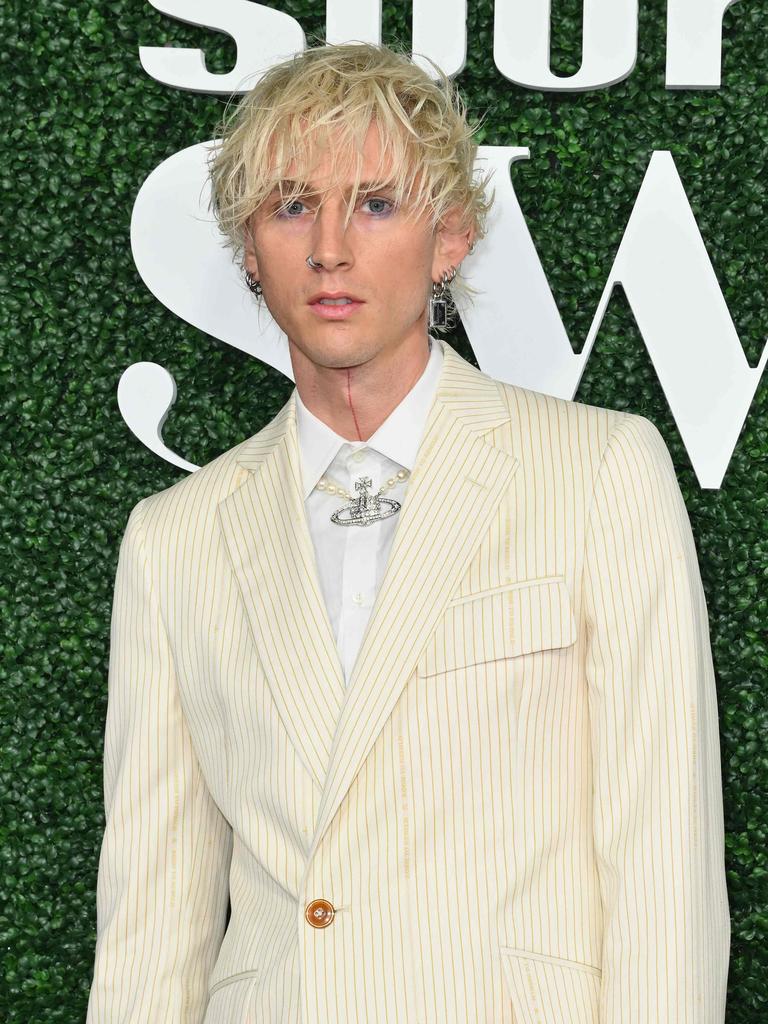 Machine Gun Kelly walked the red carpet separately. Pictres: Angela Weiss/AFP