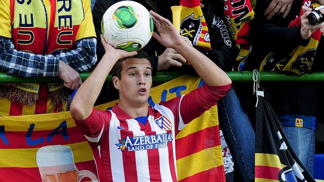 (Files) In this file picture taken on December 7, 2013, Atletico Madrid's defender Javier Manquillo Gaitan prepares to take a throw-in during the Spanish Copa del Rey (King's Cup) finals stage match against UE Sant Andreu at the Municipal Narcis Sala stadium in Barcelona. Liverpool have signed Spanish right-back Javier Manquillo on loan from reigning La Liga champions Atletico Madrid, the English Premier League club announced on Wednesday, August 6, 2014. Liverpool did not confirm the length of the loan, but 20-year-old Manquillo is reported to have committed to a two-year stay at Anfield. AFP PHOTO/ JOSEP LAGO