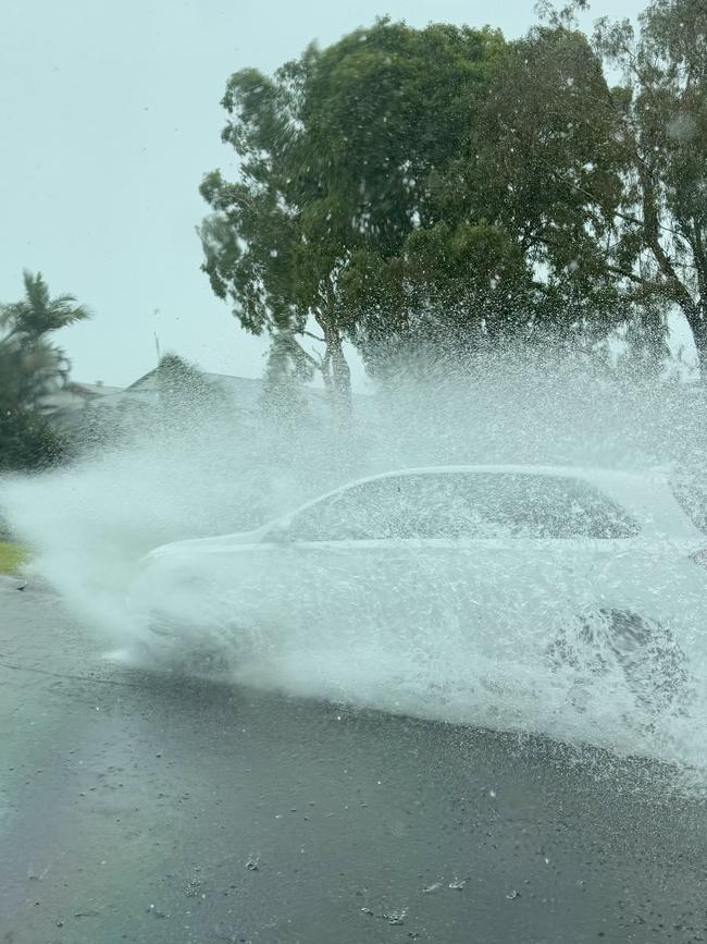 Car driving through torrential rain on Maroochydore Road. Picture: Supplied