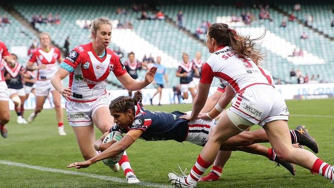 Roosters Taleena Simon breaks through to score against the Dragons last season.