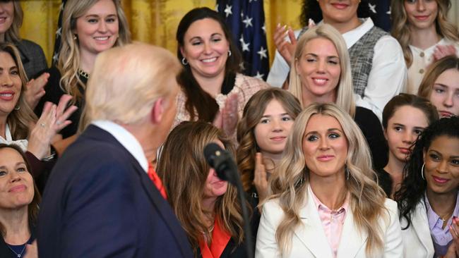 Riley Gaines was in attendance as President Trump signed the trans sport ban. (Photo by ANDREW CABALLERO-REYNOLDS / AFP)