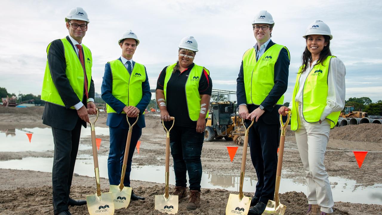 Campbell Hanan and Richard Seddon from Mirvac, Aunty Rowena, Nathan Thomas from Morgan Stanley Real Estate Investing and Meg Dutta from Mirvac mark the start of construction at Switchyard.