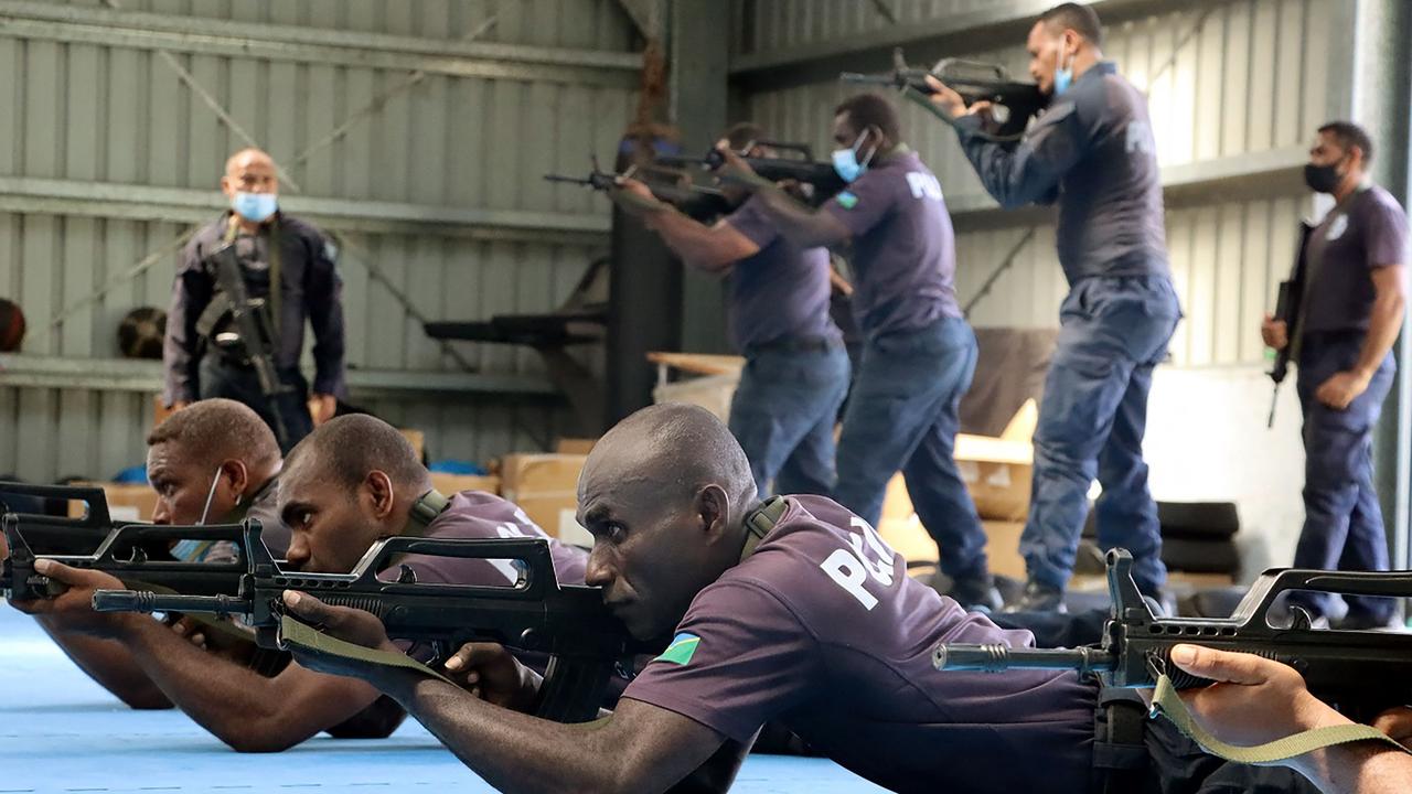 An undated photo released this week shows Chinese police training officers from the Royal Solomon Islands Police Force. Picture: AFP / Royal Solomon Islands Police Force