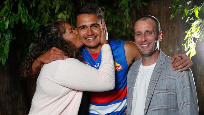 No.1 pick Jamarra Ugle-Hagan with parents Alice and Aaron.