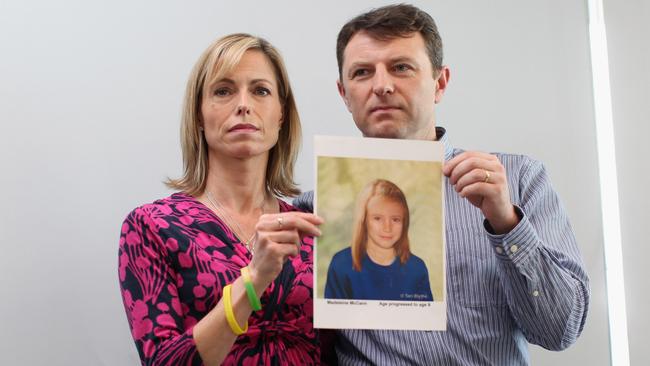 Kate and Gerry McCann hold an age-progressed police image of their daughterin the fifth anniversary of the disappearance in 2012. Picture: Getty.