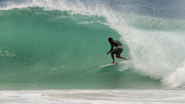 Surfers enjoying the larger than usual swell at Kirra Beach due to Tropical Cyclone Oma Picture: Jerad Williams