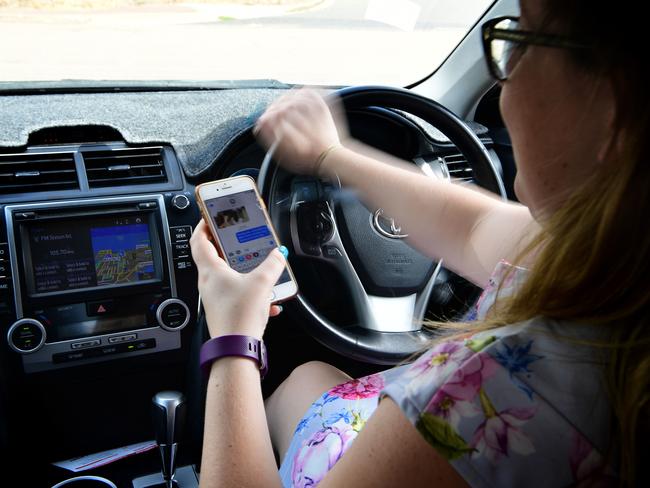 Nearly 20 per cent of Victorians backed themselves to use their phones while driving Picture: Justin Kennedy