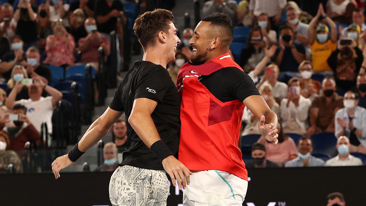 Thanasi Kokkinakis and Nick Kyrgios celebrate winning their maiden grand slam title. Picture: Michael Klein