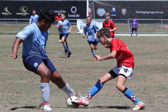 The Premier Invitational football tournament on the Gold Coast. Gold Coast Knights Red v Springfield United under-13s in action. Picture: Mike Batterham.
