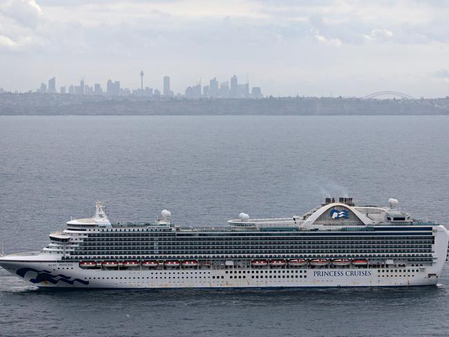 The Ruby Princess cruise ship sits off the coast of Sydney yesterday. Picture: Adam Yip