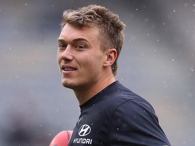PERTH, AUSTRALIA - AUGUST 09: Patrick Cripps of the Blues warms up during the round 11 AFL match between the West Coast Eagles and the Carlton Blues at Optus Stadium on August 09, 2020 in Perth, Australia. (Photo by Paul Kane/Getty Images)