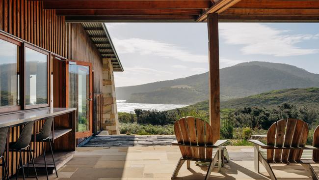 Roaring Beach House on the Tasman Peninsula exterior. Home is made of Buckland sandstone with external cladding of macrocarpa pine. MUST CREDIT Adam Gibson. For TasWeekend Travel story ONE-TIME USE ONLY for re-use must contact mag editor Kirsty Eade