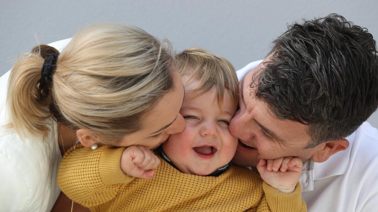 Sophie and Julian Parkinson with son Liam. Picture: Annette Dew