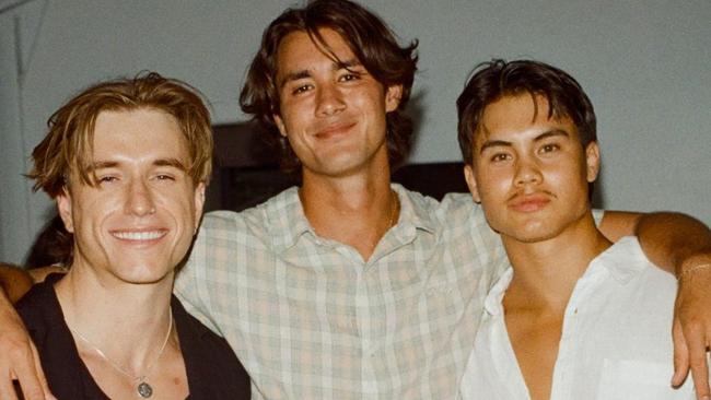 TikTok Australia’s Video of the Year winner Andrew Davie (centre) with friends at a Byron Bay party drinking Byron Bay Brewery beer. Picture: Instagram/andrewdavie8