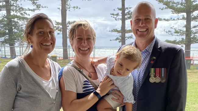 Ex-serviceman Miles Wootten and therapist Claire Dunkley (centre) with her partner on Anzac Day, 2022.