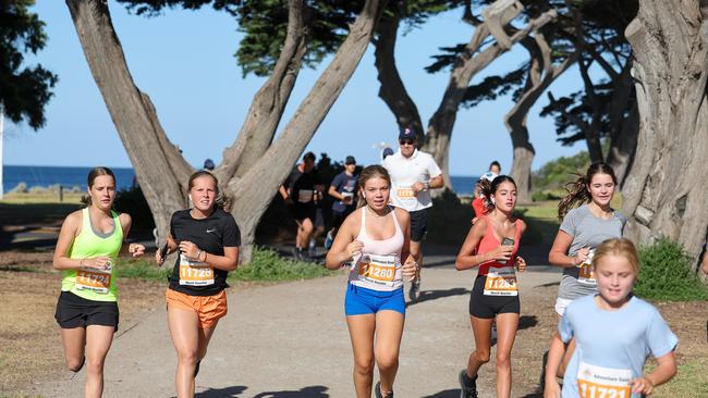 Junior competitors dash around the course in 2023 Portsea Bay to Surf Run.