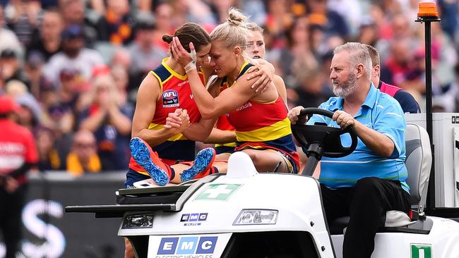 Erin Phillips of the Adelaide Crows is driven off the ground after sustaining an injury during the AFLW Grand Final. Picture: Daniel Kalisz/Getty Images