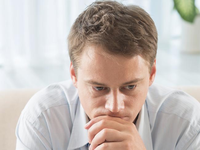 generic images illustrating depression. Picture istock Closeup image of a despair business patient waiting for psychologist for session