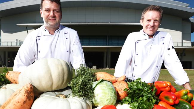 The Gold Coast Convention and Exhibition Centre Executive Chef Garry Kindred (left) and Sous Chef Adam Hall are show support to community organisations and educational institutions during COVID-19. Photograph: Jason O'Brien