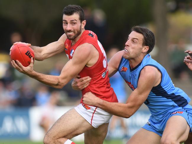 SANFL NORTH V STURT at Prospect Oval. Sturts no 7 Fraser Evans tackles North's no 32 Leigh Ryswyk.  Pic: Tricia Watkinson.