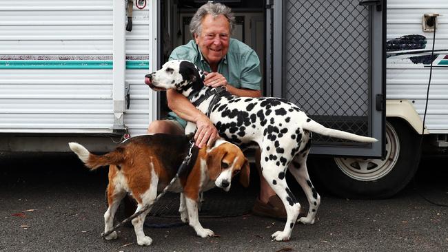 31/12/19 Sarsfield resident Barry Wear with his dogs Domino, right, and Snow Pea at the bushfire relief centre in Bairnsdale. Aaron Francis/The Australian