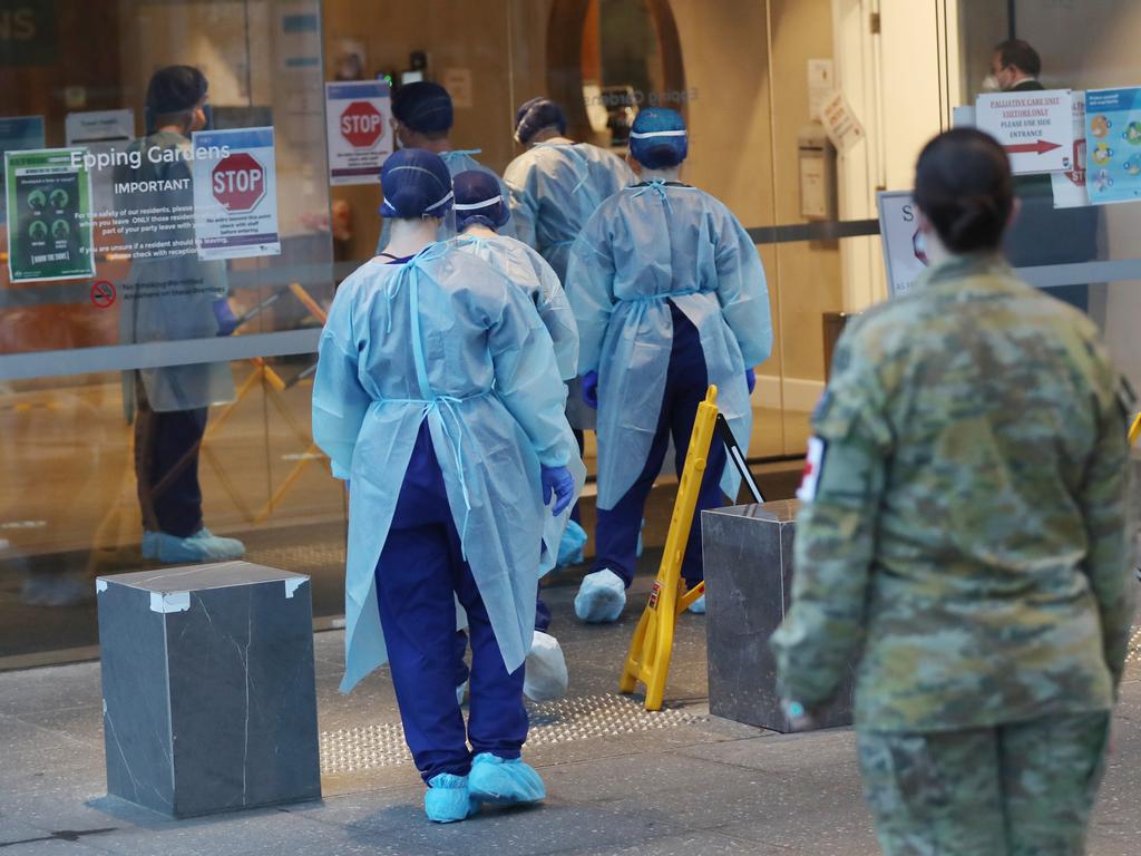 ADF and medical workers scramble to deal with a virus outbreak at Epping Gardens aged care. Picture: David Crosling