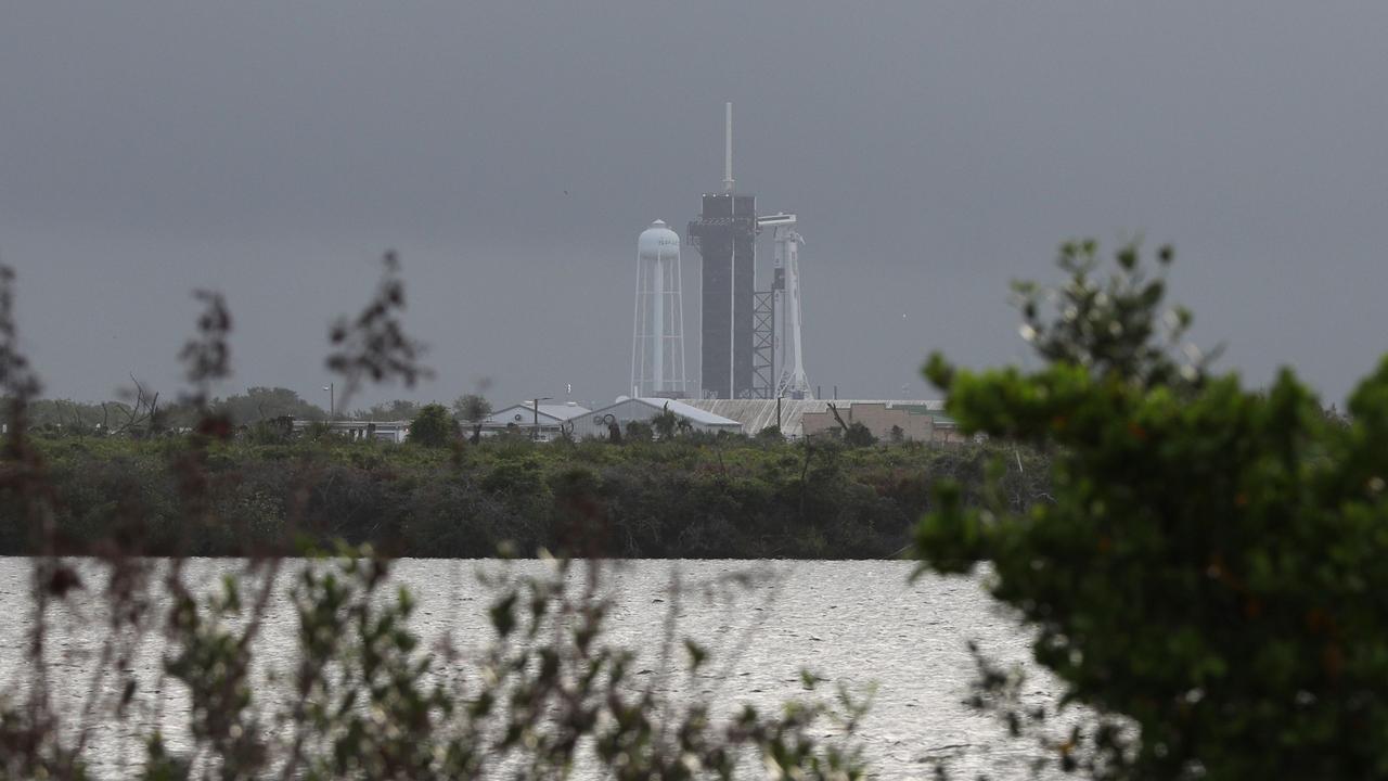 Stormy weather looms around the launch complex at the Kennedy Space Centre on Tuesday. Picture: Gregg Newton / AFP