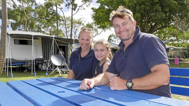 AT CAPACITY: Relief managers Alex, Sienna, 10, and Chris Evans at Scarness Beachside Caravan Park are happy booking numbers are soaring this festive season. INSET: (right) Lyn Jarman pictured with husband Allan has been coming to Hervey Bay for Christmas 66 years. Picture: Jessica Lamb