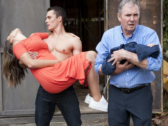 Paige (Olympia Valance) is dramatically rescued by Father Jack (Andrew Morley) and Dr Karl Kennedy (Alan Fletcher). Picture: Ten Network