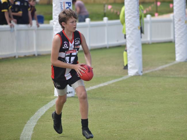 Chayse Hollows in the North Mackay Saints v Mackay Swarks u14 AFL grand final at Magpies Sporting Club, Mackay, September 11, 2021. Picture: Matthew Forrest