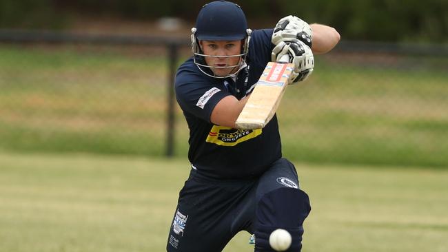 Hoppers Crossing batsman Chris Henry gets on the front foot. Picture: Stuart Milligan