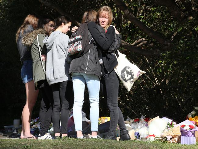 People continue to drop flowers at the  fence of 107 Hull rd west Penant hills the home where jack & Jennifer Edwards were shot to death by their father .pic John Grainger