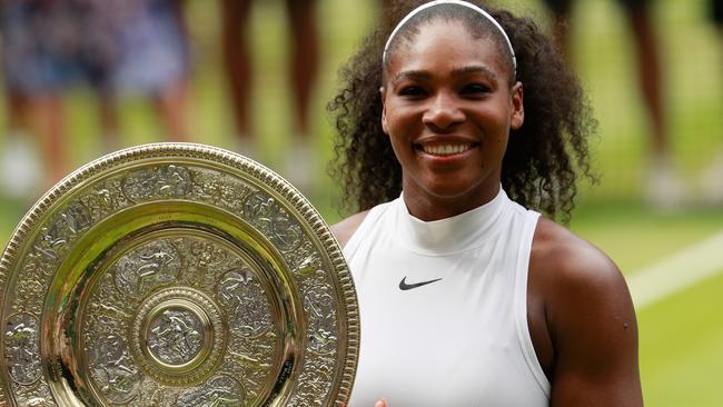 Serena Williams holds the trophy following victory at Wimbledon.  Picture:  Getty