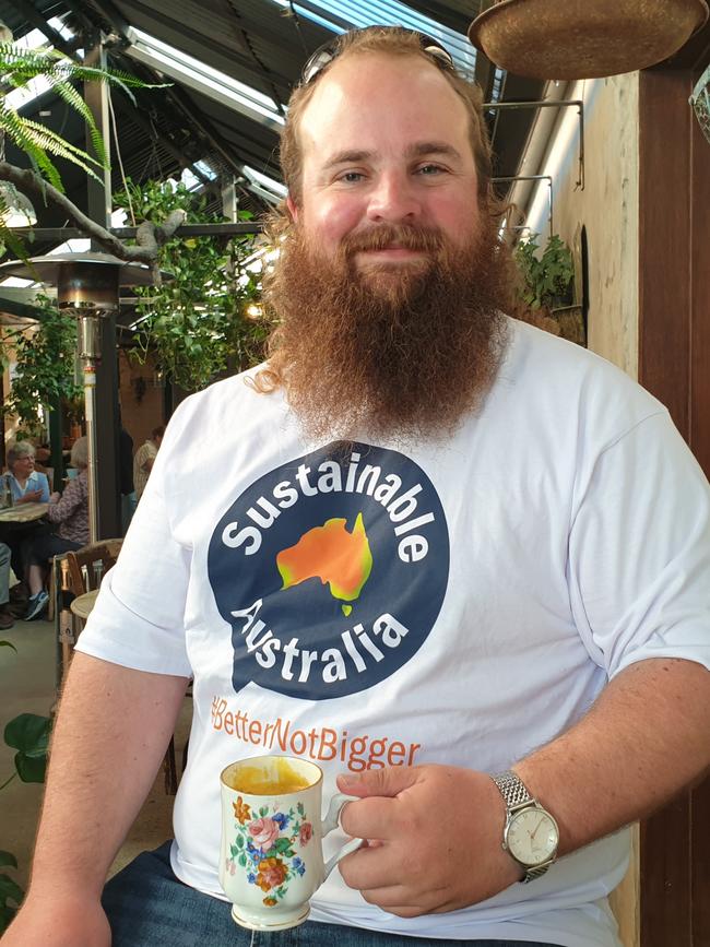 Calum Blair - Sustainable Australia Party - Having a chai latte at Worn Out Wares in Singleton. Supplied.