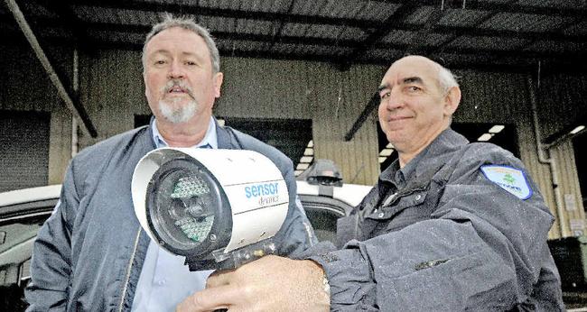 DON’T GET CAUGHT: Byron Bay ranger Mal Hamilton and Lismore ranger Glenn Pease with the new parking camera, which is being deployed in the Lismore CBD. Picture: Doug Eaton