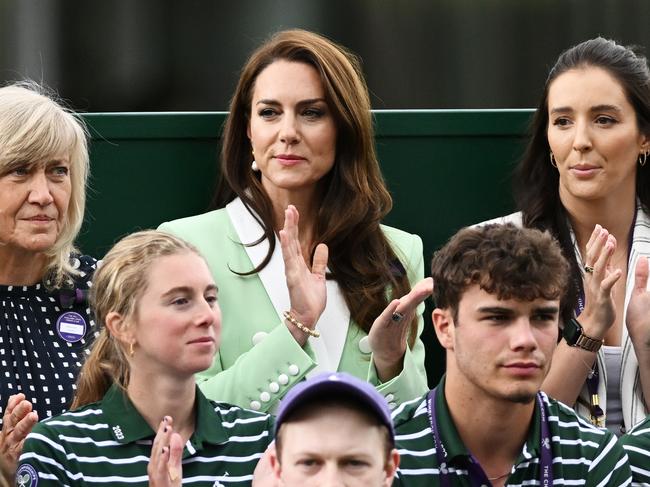 Catherine, Princess of Wales is seen with Deborah Jevans and Laura Robson (R) as they applaud during the Women's Singles first round match between Katie Boulter of Great Britain and Daria Saville of Australia. (Photo by Mike Hewitt/Getty Images)