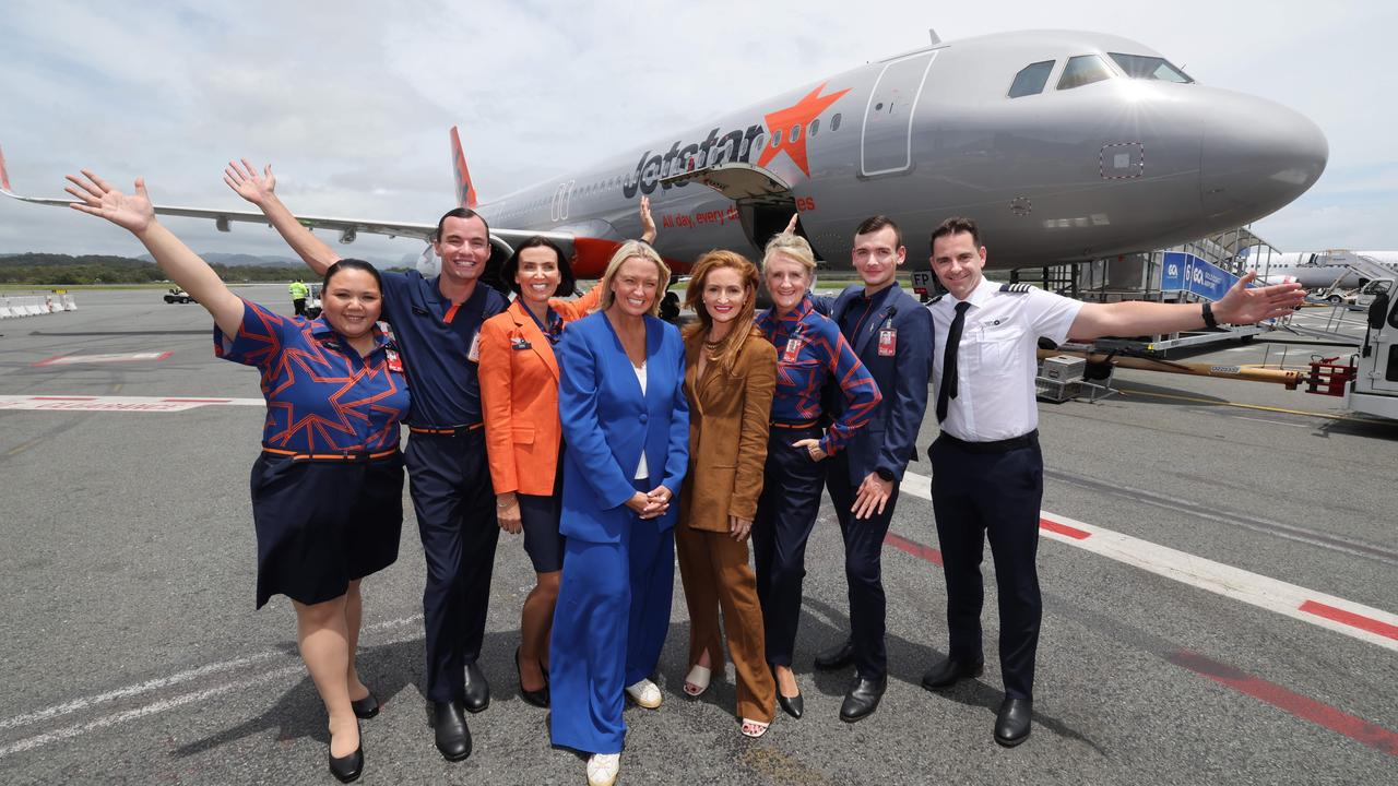 Jetstar aircrew and staff officially launched the new Jetstar uniforms at a media event at Gold Coast Airport, including a fashion show in the aisle of one of their planes. Picture Glenn Hampson