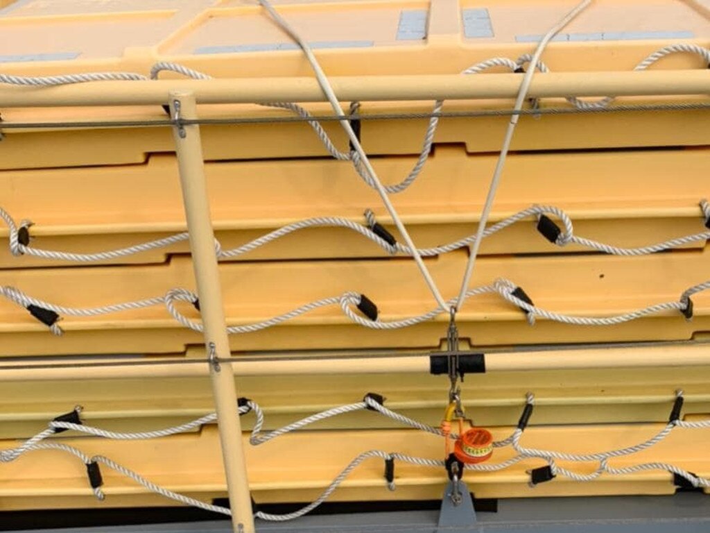 Life rafts on the Clontarf Emerald Class ferry have been cable-tied to the storage racks after one flew free and damaged two bench seats. Picture: Chris Cowper / Facebook,