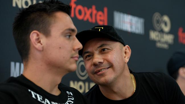 Australian boxing great Kostya Tszyu speaks to his son Tim. AAP Image/Dan Himbrechts.