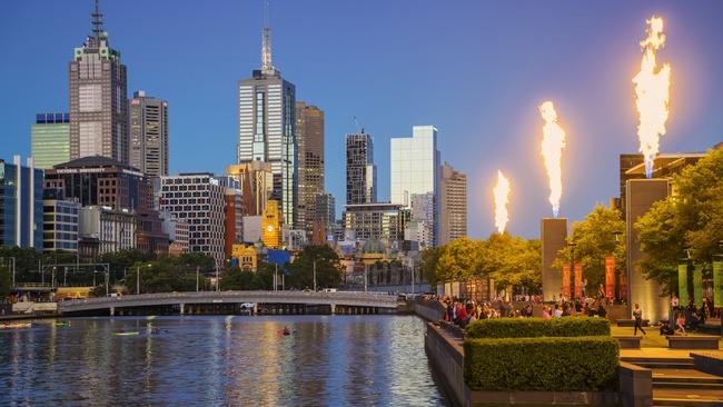 Spectators watch as Crown’s gas brigades shoot fire into the night sky at Southbank. Picture: iStock