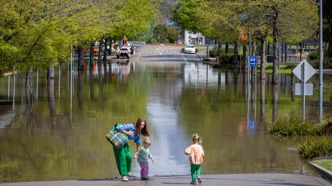 Flood waters rise in The Port of Sale, near the junction of the Macalister, Thompson and La Trobe rivers in Gipsland. Bystanders watch the flooding along the shores of the port. Picture: Jason Edwards