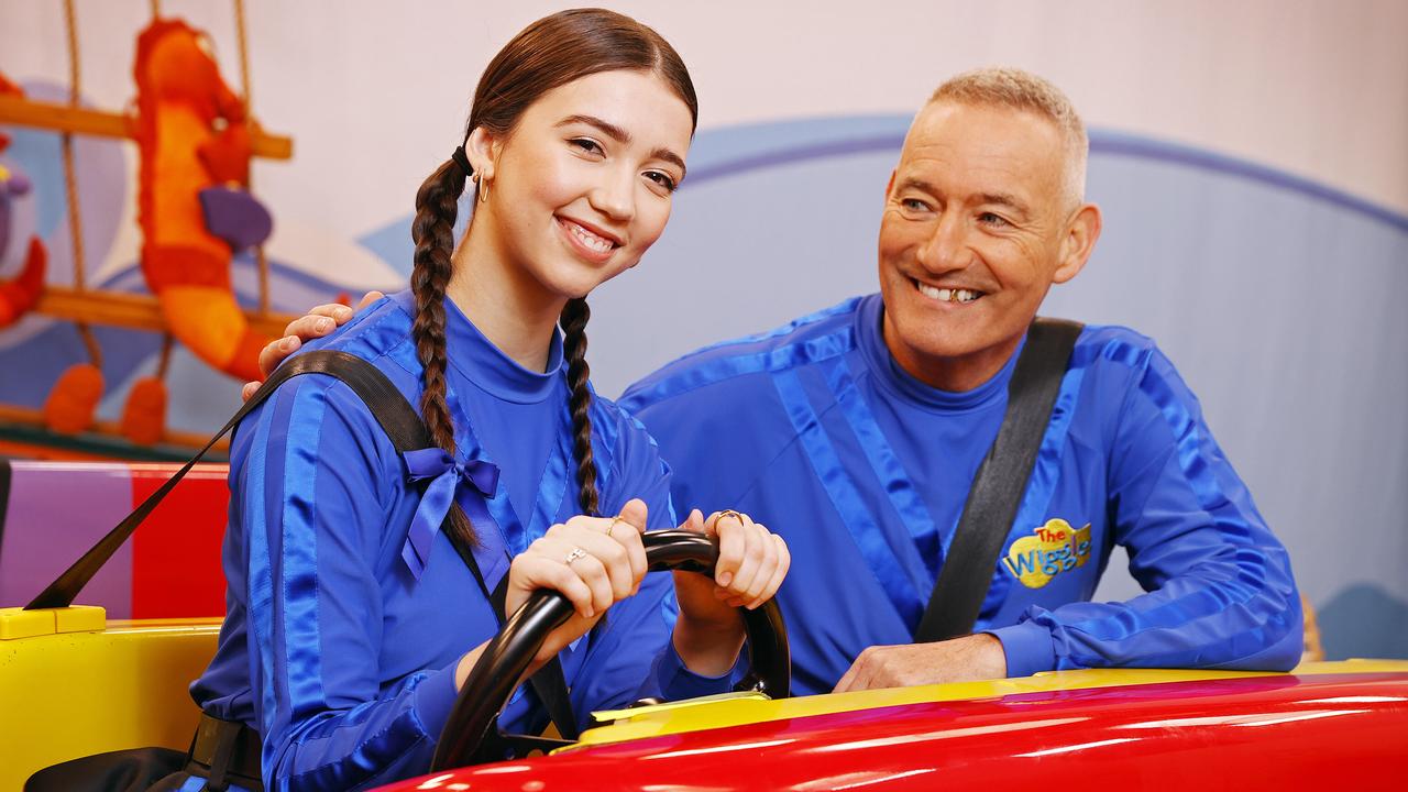 Original Blue Wiggle Anthony Field has scooted over in the famous big red car to make room for his daughter Lucia, 18, who is joining her dad in the blue skivvy. Picture: Sam Ruttyn