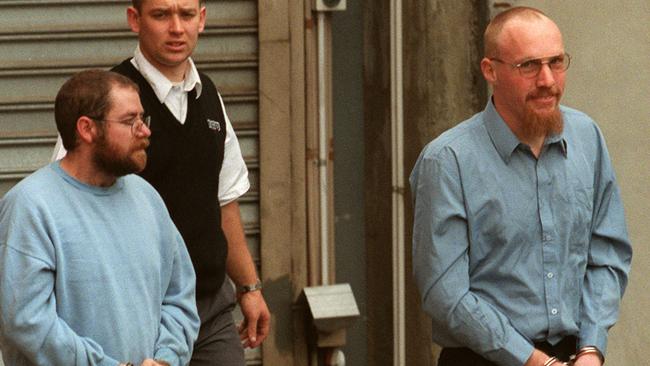 Bunting and Wagner being led into court in June 2000. Picture: Brodie Campbell